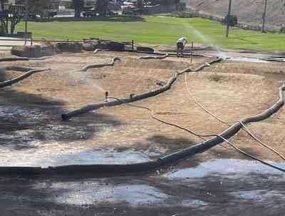 Aerial view of Tyler watering the track at El Nido RC Track